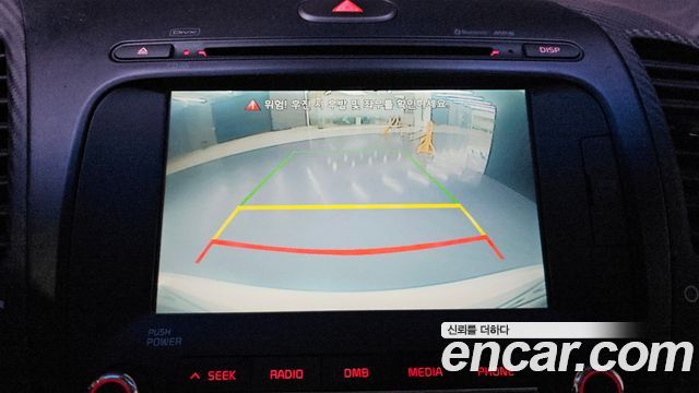 Kia K3 2013 — photo 18