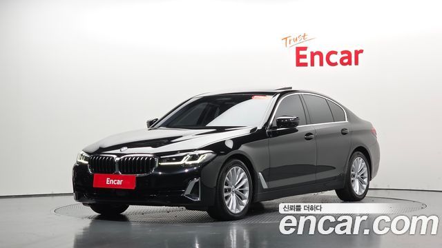 BMW 5-Series 2023 — photo 32