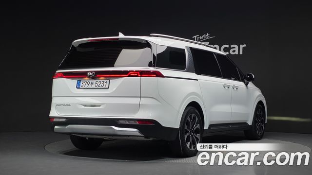Kia Canival 2021 — photo 2