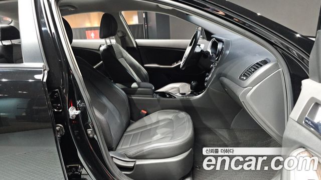 Kia K5 2012 — photo 18