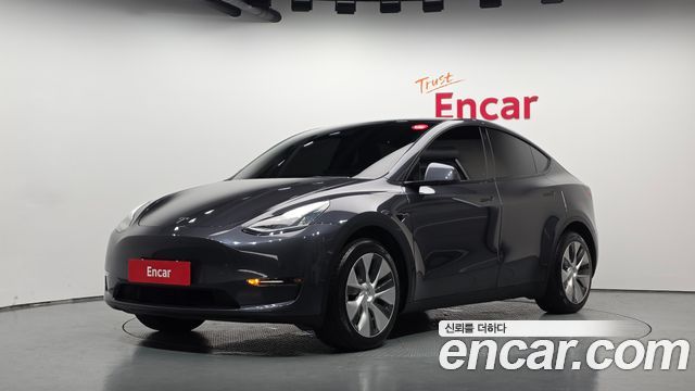 Tesla Model Y 2021 — photo 1
