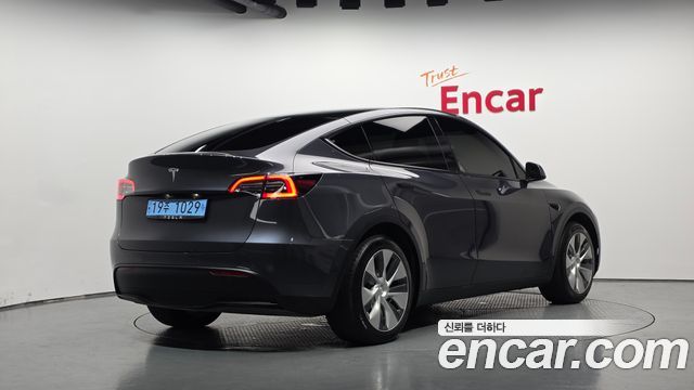 Tesla Model Y 2021 — photo 2