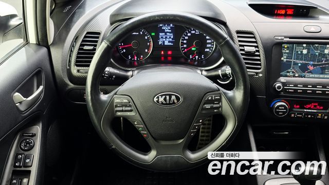 Kia K3 2014 — photo 13