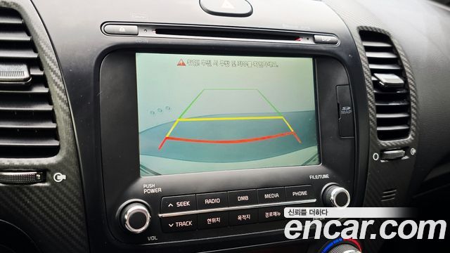 Kia K3 2014 — photo 16