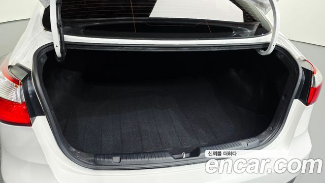 Kia K3 2014 — photo 19