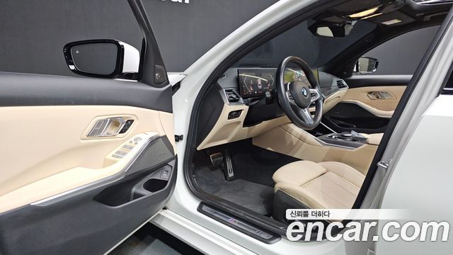 BMW 3-Series 2023 — photo 13
