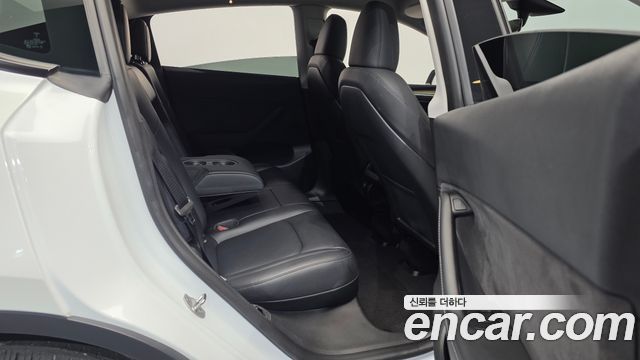 Tesla Model Y 2024 — photo 18