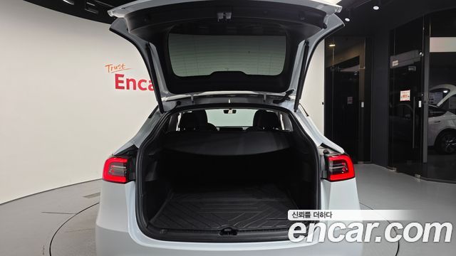 Tesla Model Y 2024 — photo 26