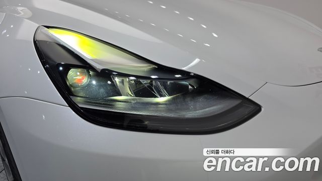 Tesla Model Y 2024 — photo 8