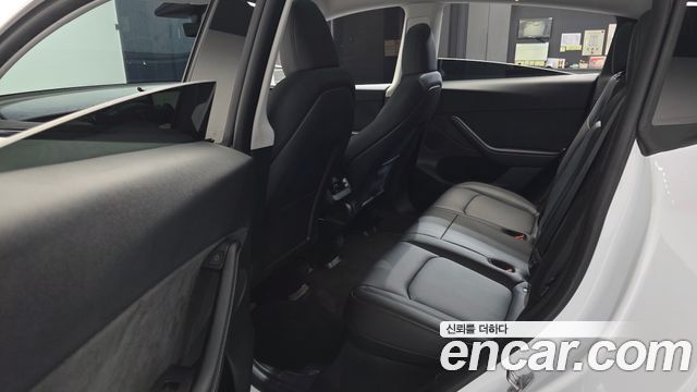 Tesla Model Y 2024 — photo 16