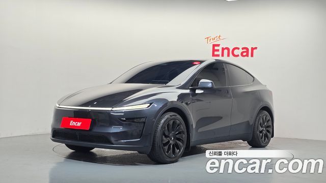 Tesla Model Y 2025 — photo 1