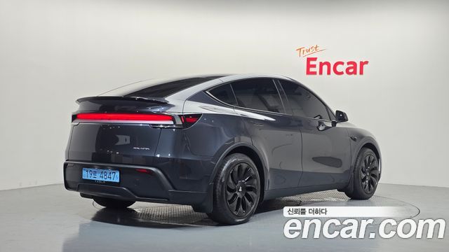 Tesla Model Y 2025 — photo 2