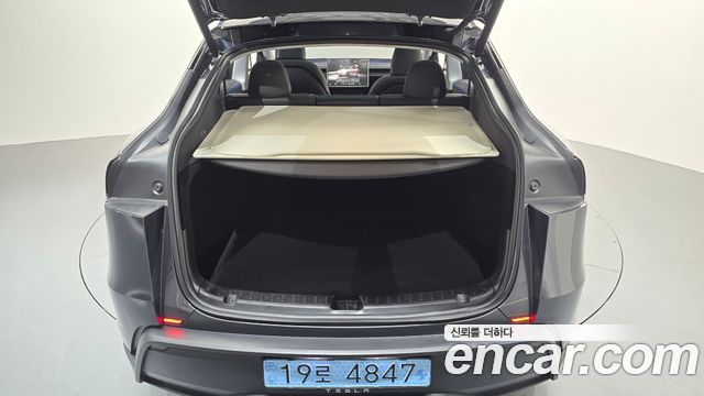 Tesla Model Y 2025 — photo 23