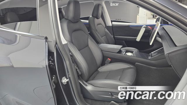 Tesla Model Y 2025 — photo 16