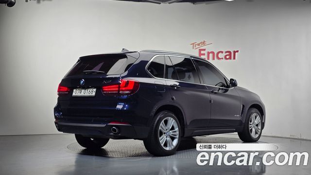 BMW X5 2015 — photo 2