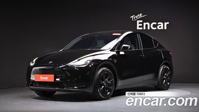 Tesla Model Y 2024 — photo 31