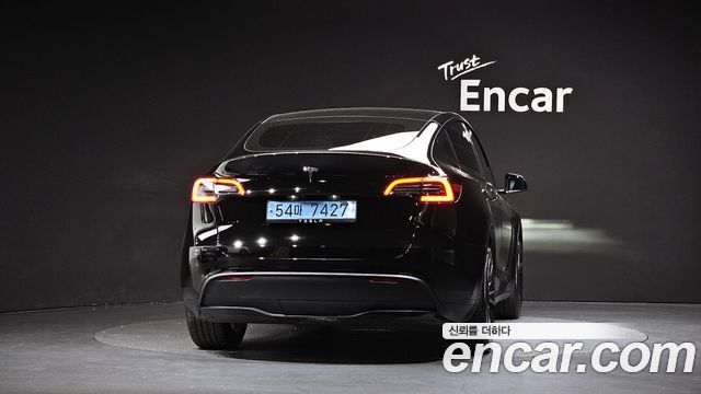 Tesla Model Y 2024 — photo 4