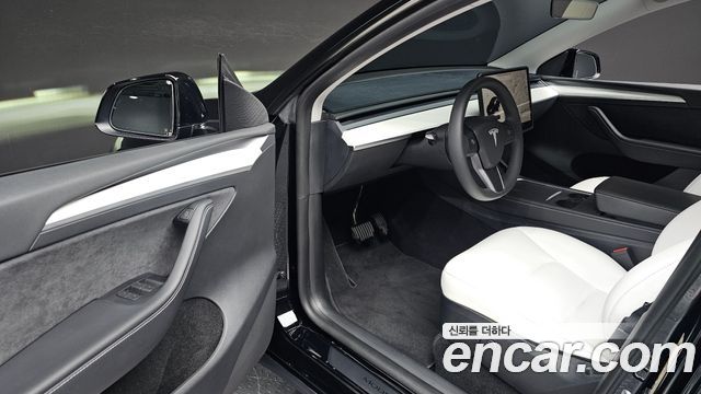 Tesla Model Y 2024 — photo 13