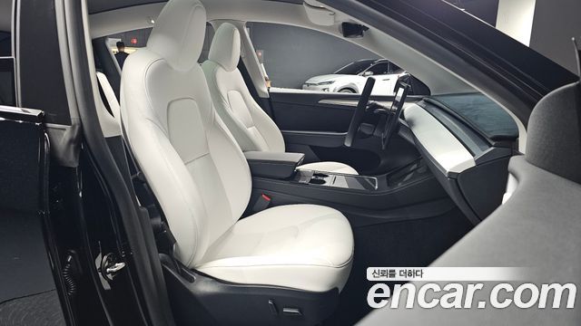 Tesla Model Y 2024 — photo 16