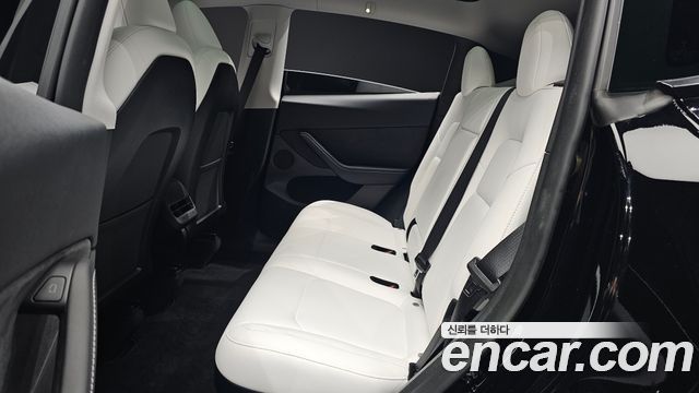 Tesla Model Y 2024 — photo 28
