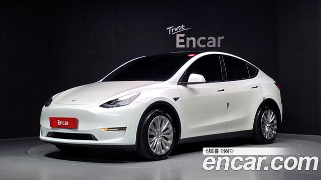Tesla Model Y 2021 — photo 1