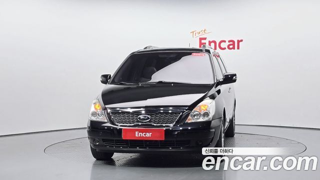 Kia Canival 2012 — photo 3