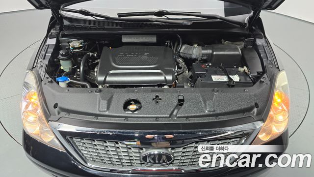 Kia Canival 2012 — photo 6