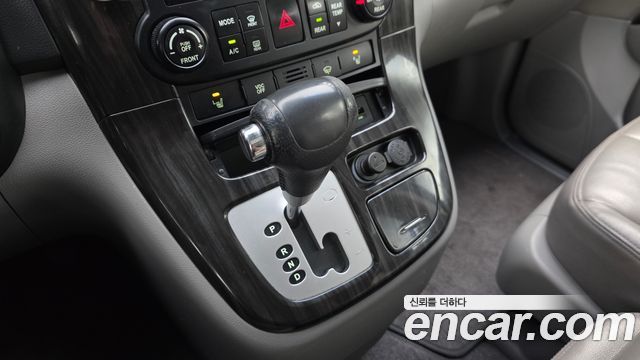 Kia Canival 2012 — photo 12