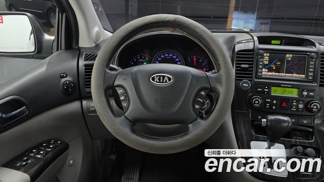 Kia Canival 2012 — photo 18