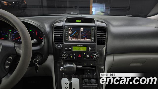 Kia Canival 2012 — photo 19