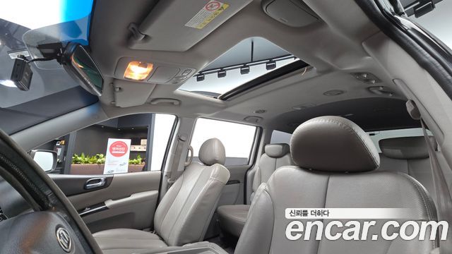Kia Canival 2012 — photo 25