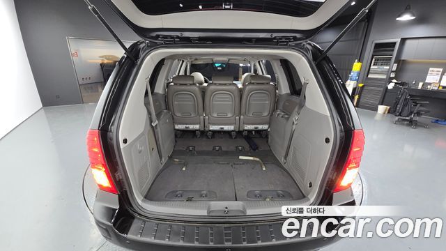 Kia Canival 2012 — photo 26