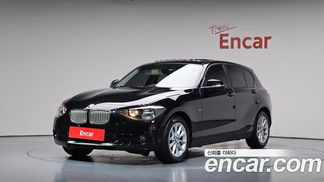 BMW 1-Series 2014 — photo 1