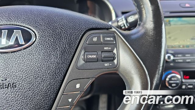 Kia K3 2015 — photo 16