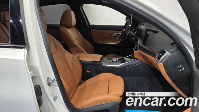 BMW 3-Series 2024 — photo 16