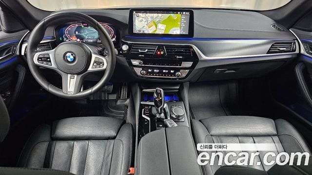 BMW 5-Series 2023 — photo 10