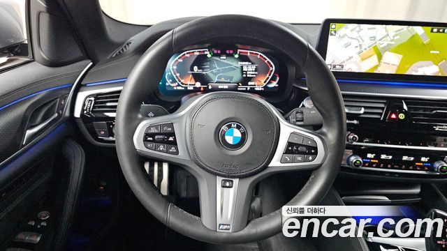 BMW 5-Series 2023 — photo 19
