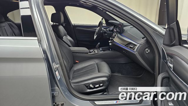 BMW 5-Series 2023 — photo 16