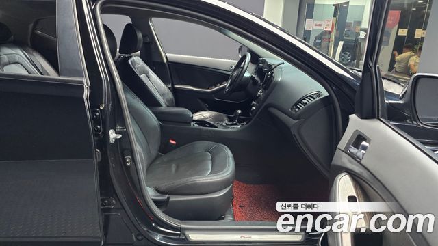Kia K5 2011 — photo 11