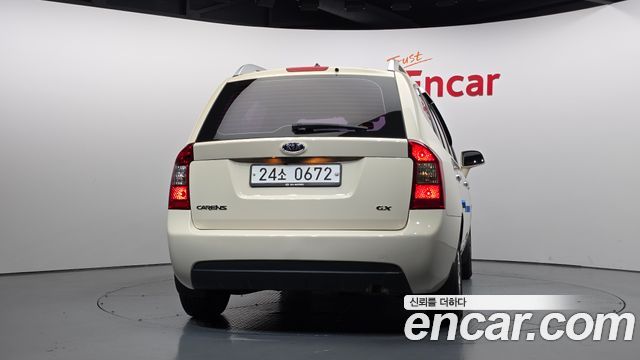 Kia Carens 2011 — photo 4