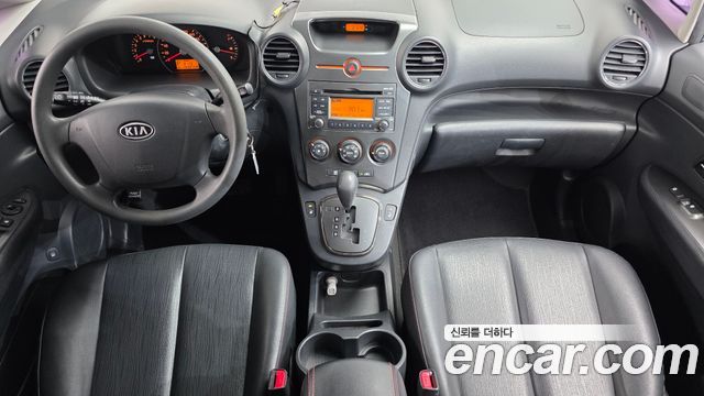 Kia Carens 2011 — photo 7
