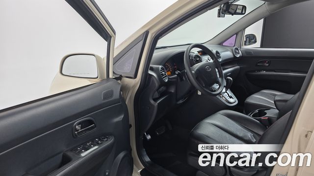 Kia Carens 2011 — photo 10