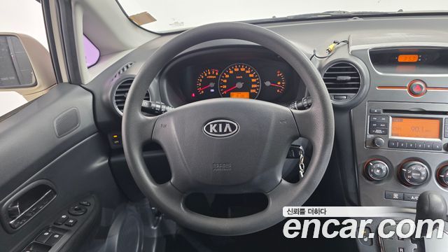 Kia Carens 2011 — photo 13
