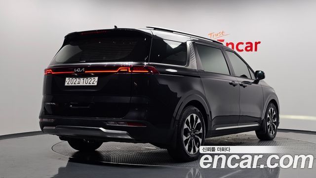 Kia Canival 2022 — photo 2