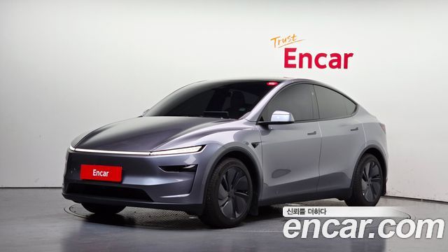 Tesla Model Y 2025 — photo 1