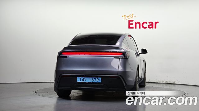 Tesla Model Y 2025 — photo 4