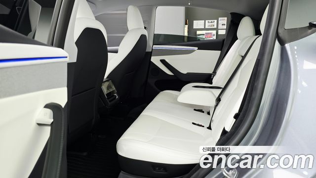 Tesla Model Y 2025 — photo 17