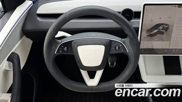 Tesla Model Y 2025 — photo 19