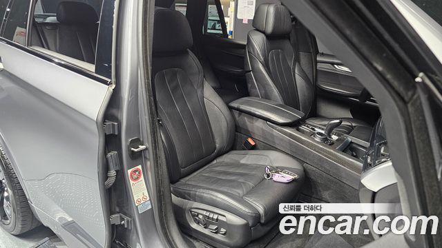 BMW X5 2014 — photo 18