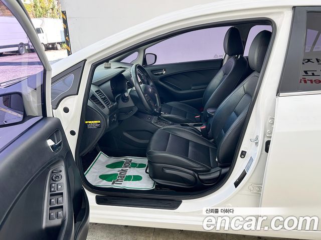 Kia K3 2013 — photo 13